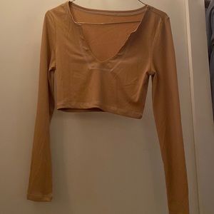 Size small beige with white stitching